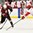 GRAND FORKS, NORTH DAKOTA - APRIL 21: Latvia's Vlads Vulkanovs #13 shoots the puck while Denmark's Jakob Jessen #9 defends during relegation round action at the 2016 IIHF Ice Hockey U18 World Championship. (Photo by Matt Zambonin/HHOF-IIHF Images)


